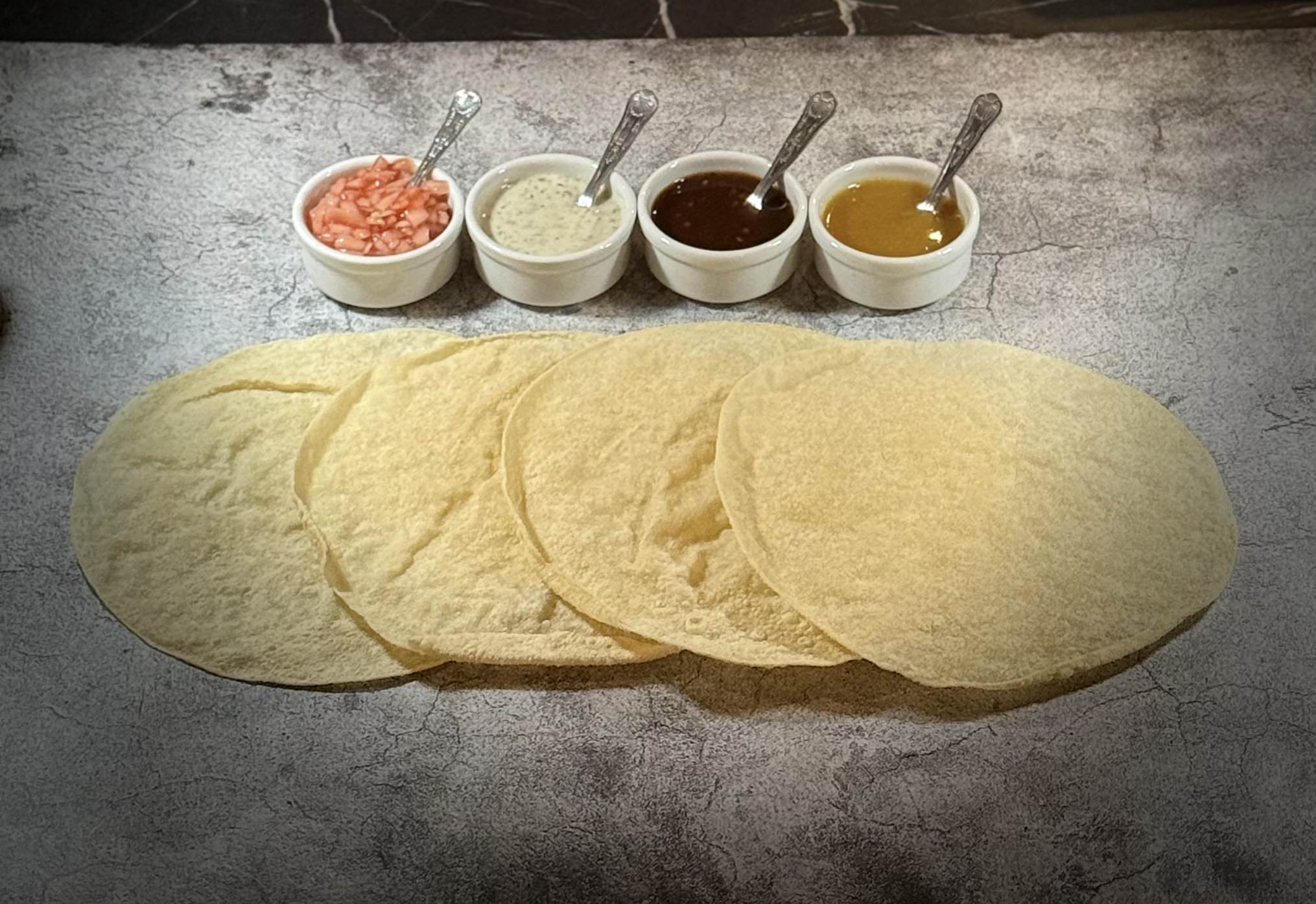Popadoms with chutneys and sauces